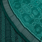 Folded presentation of the Green and Green Sambalpuri cotton saree.