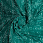 Draped view of the Green Sambalpuri cotton saree showing its handwoven texture and motifs.