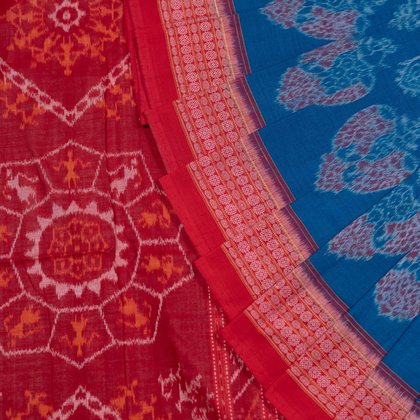 Folded presentation of the Blue and Red Sambalpuri cotton saree.