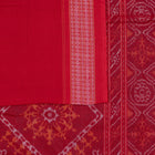 Included blouse piece and coordinated border of the Blue and Red Sambalpuri cotton saree.