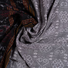 Draped view of the Grey Sambalpuri cotton saree showing its handwoven texture and motifs.