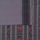 Included blouse piece and coordinated border of the Grey and Black Sambalpuri cotton saree.