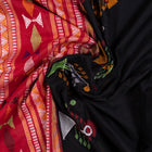 Draped view of the Black Bomkai cotton saree showing its handwoven texture and butta.