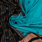 Draped view of the Green Bomkai cotton saree showing its handwoven texture and butta.