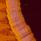 Folded presentation of the Maroon and Yellow Bomkai cotton saree.