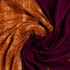 Draped view of the Maroon Bomkai cotton saree showing its handwoven texture and butta.