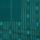 Included blouse piece and coordinated border of the Cream and Green Bomkai cotton saree.