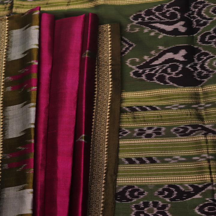 Magenta Khandua silk saree styled; green blouse accentuates the butta pattern and rich drape.