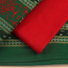 Detail of the green and red Sambalpuri cotton dress material blouse piece with motifs.
