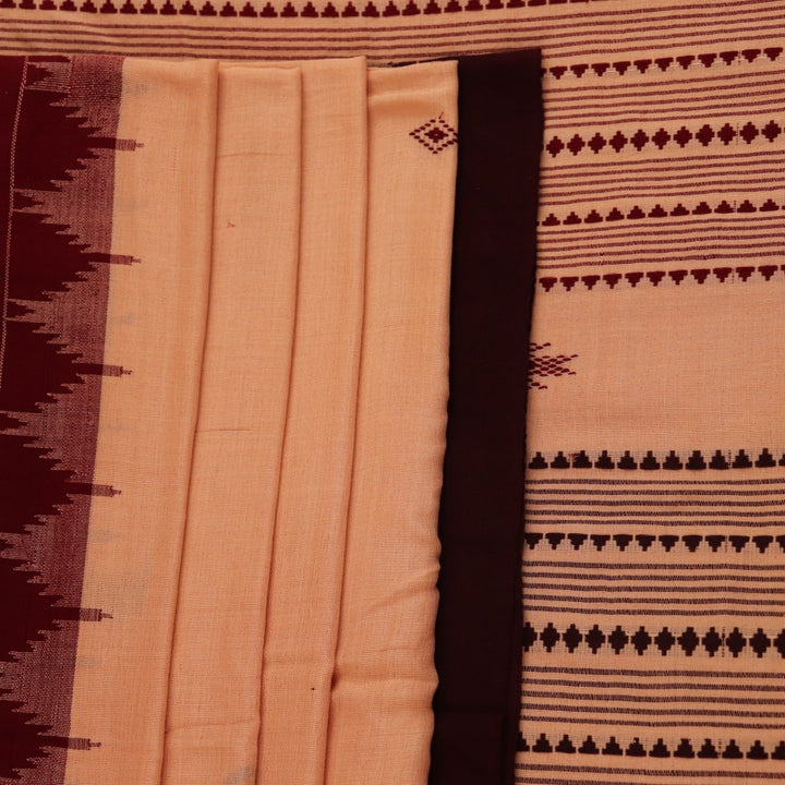 Full view of a cream-colored handloom Kotpad cotton saree with maroon butta patterns