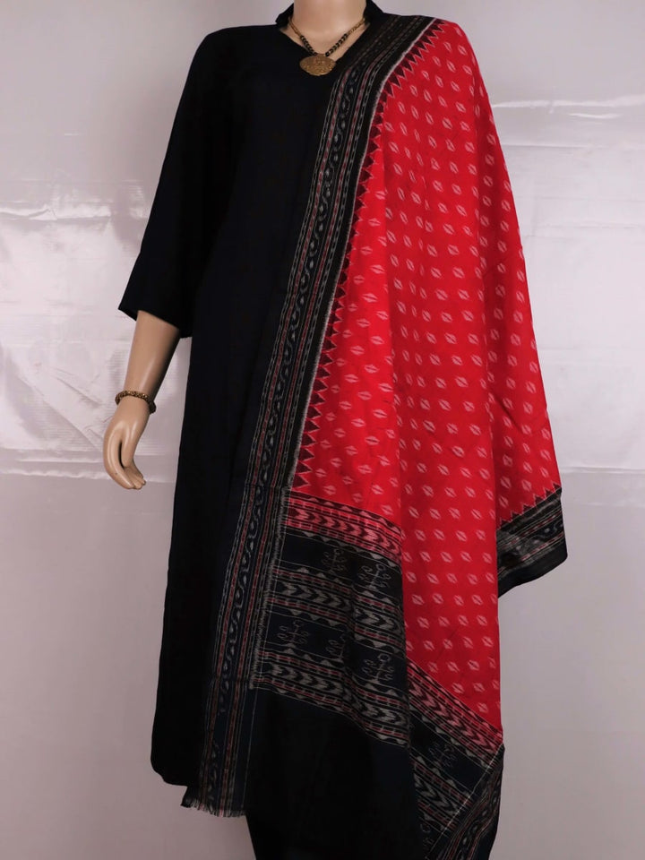 Styling view of a red and black Sambalpuri cotton dupatta with intricate motifs