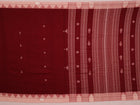 Full view of a maroon and off-white cotton Kotpad saree adorned with a traditional butta pattern.