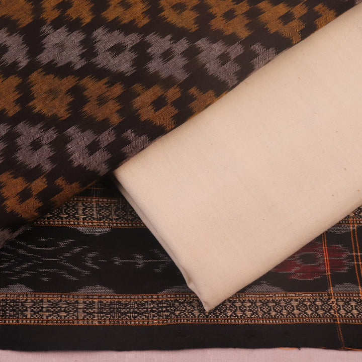 Detail of brown and white Sambalpuri cotton dress material blouse piece with motifs.