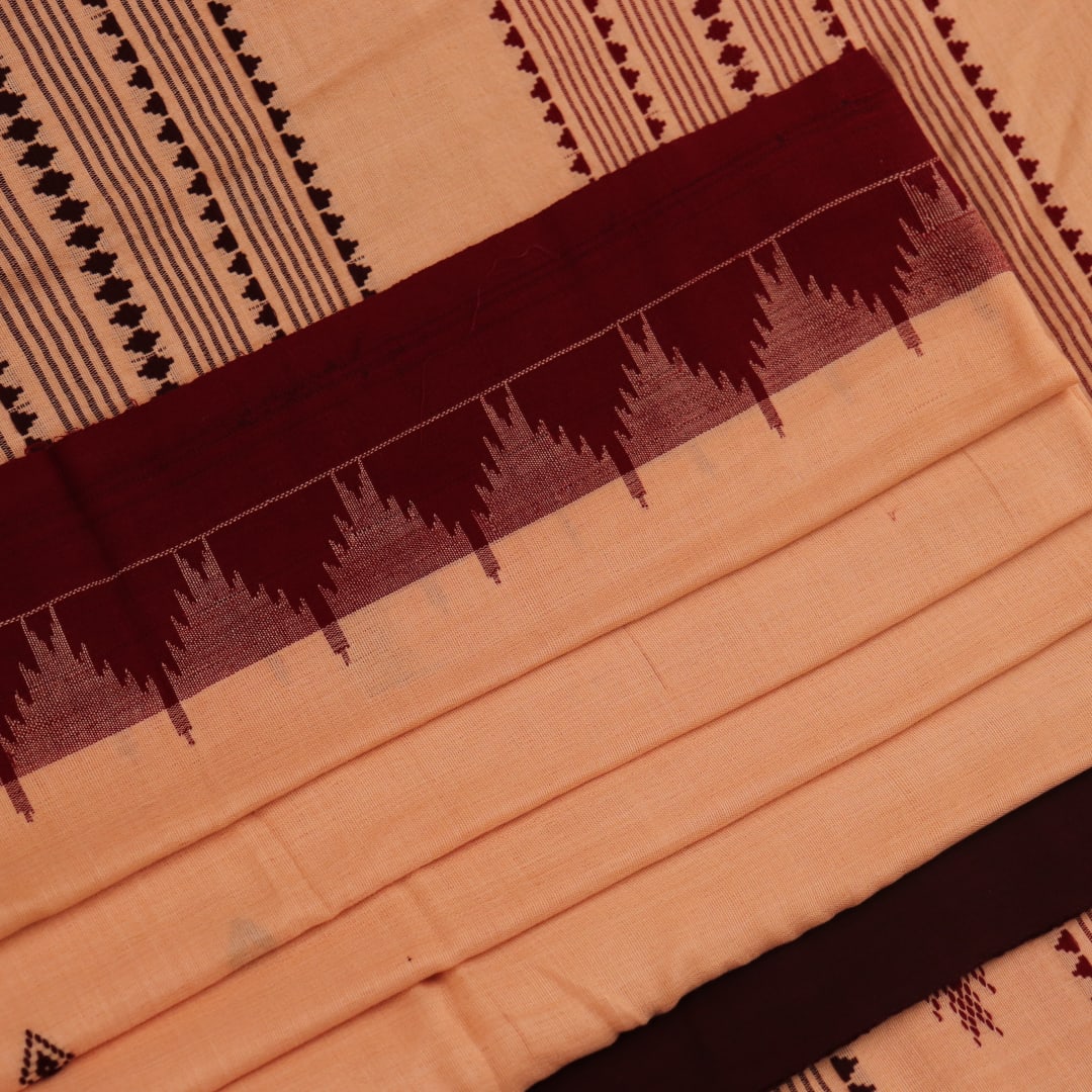 Full view of a cream-colored handloom Kotpad cotton saree with maroon butta patterns