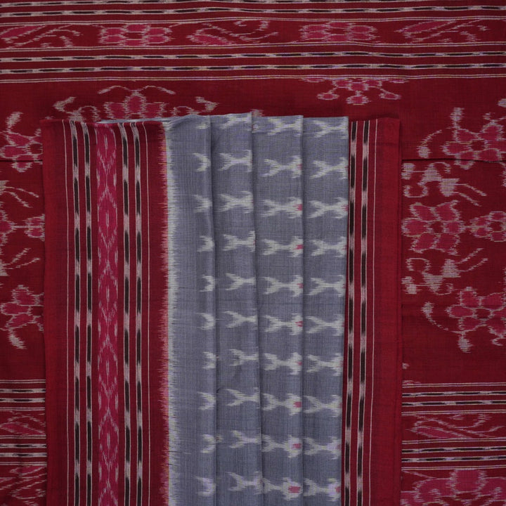 Elegant styling of a grey and maroon Sambalpuri cotton saree with hand-woven ikat motifs draped on a model.