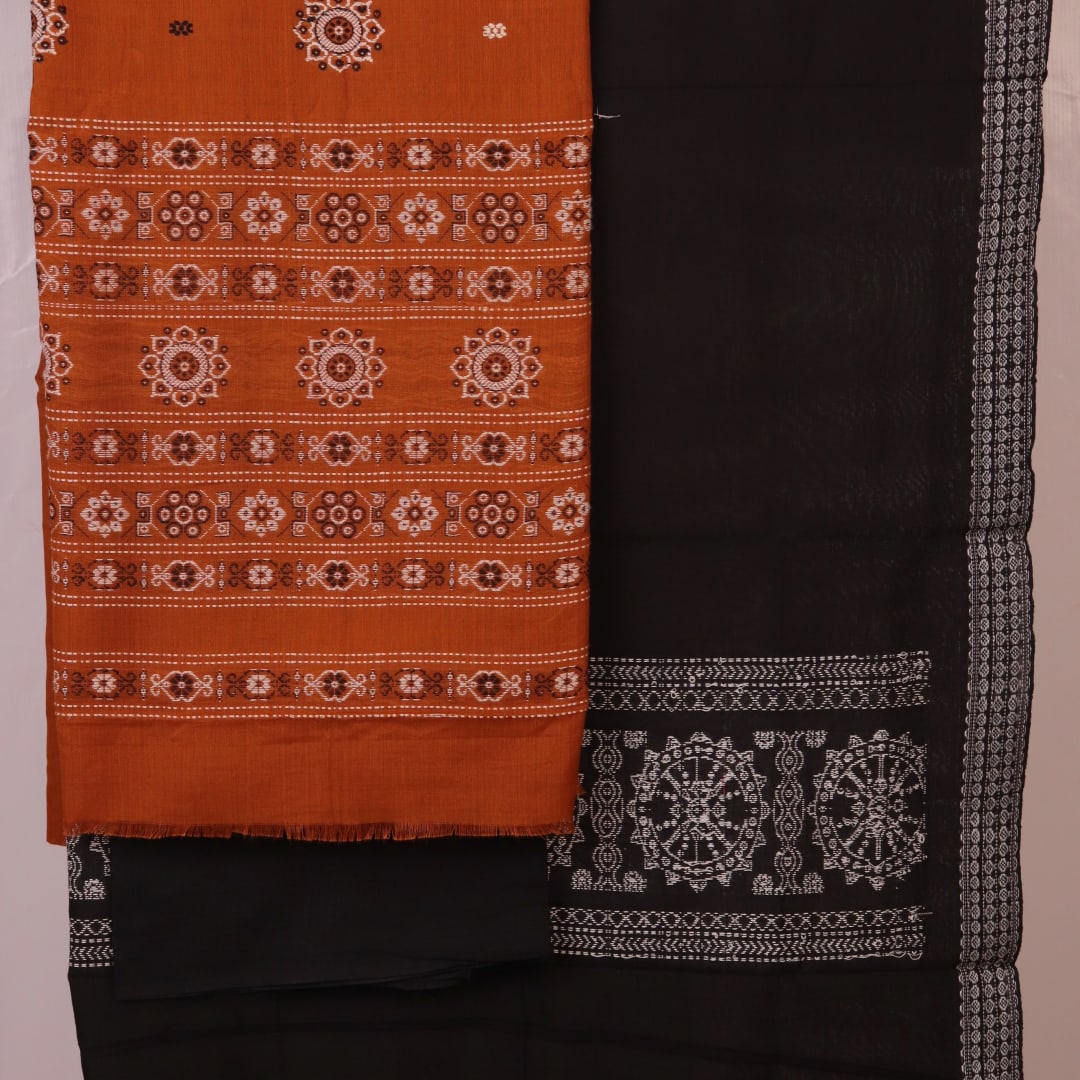 Detailed view of the black Bomkai cotton blouse piece, matching the yellow dress material.