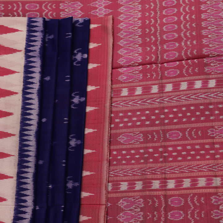 Close-up of soft, shimmering blue and peach silk fabric with intricate Sambalpuri motifs