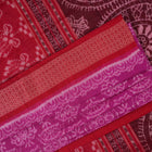 Full length view of the pink and red Sambalpuri cotton saree displaying the complete motif design.