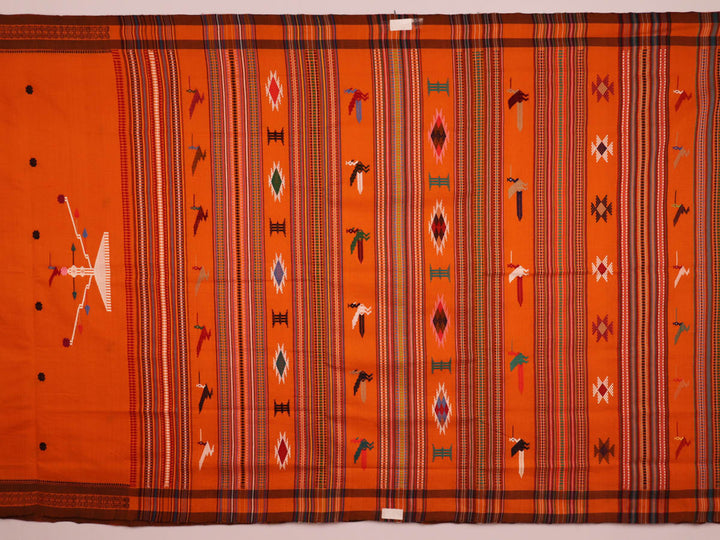 Full-length view of an orange cotton Berhampuri saree with a butta pattern and broad orange borders.