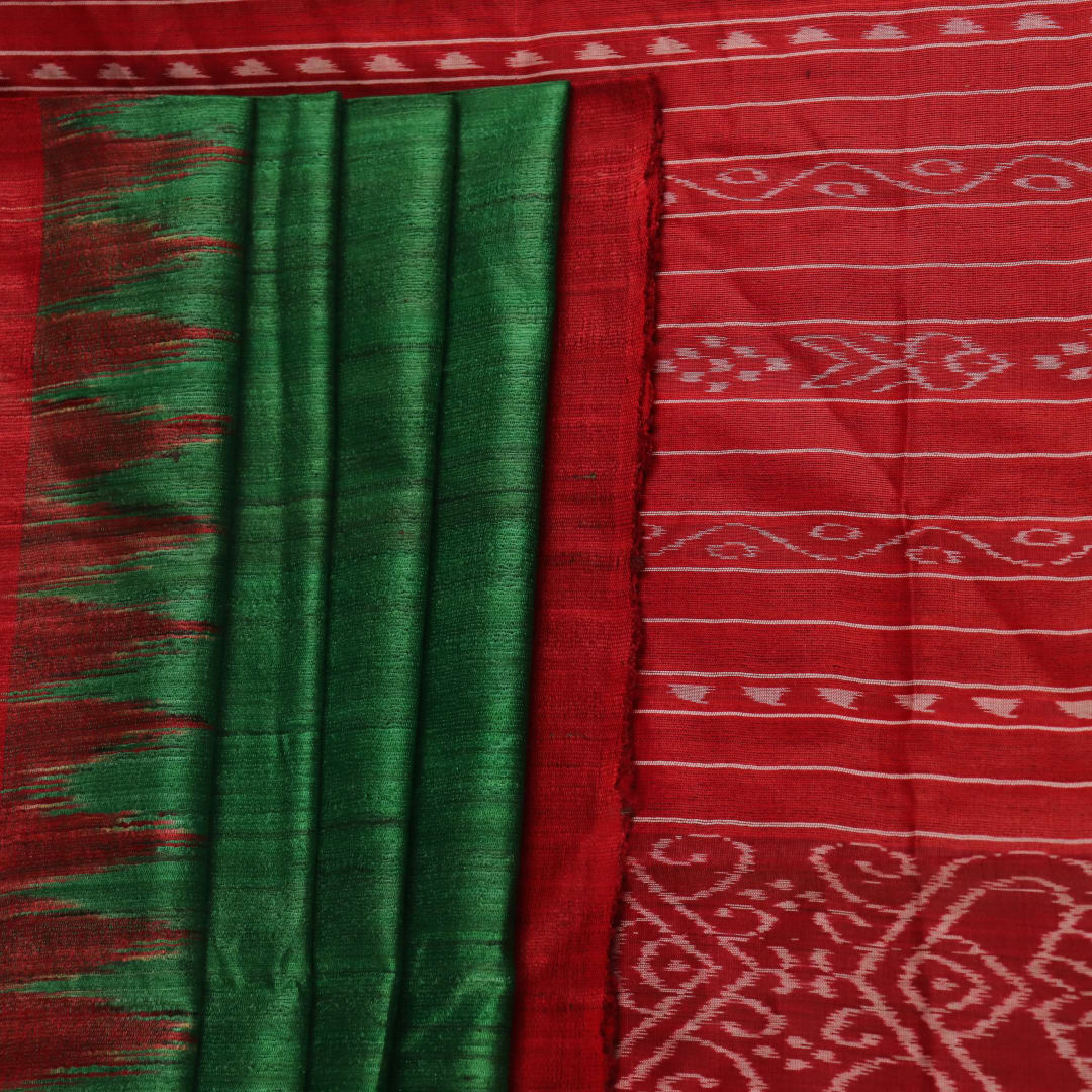 Close-up of green and red tussar silk saree fabric texture