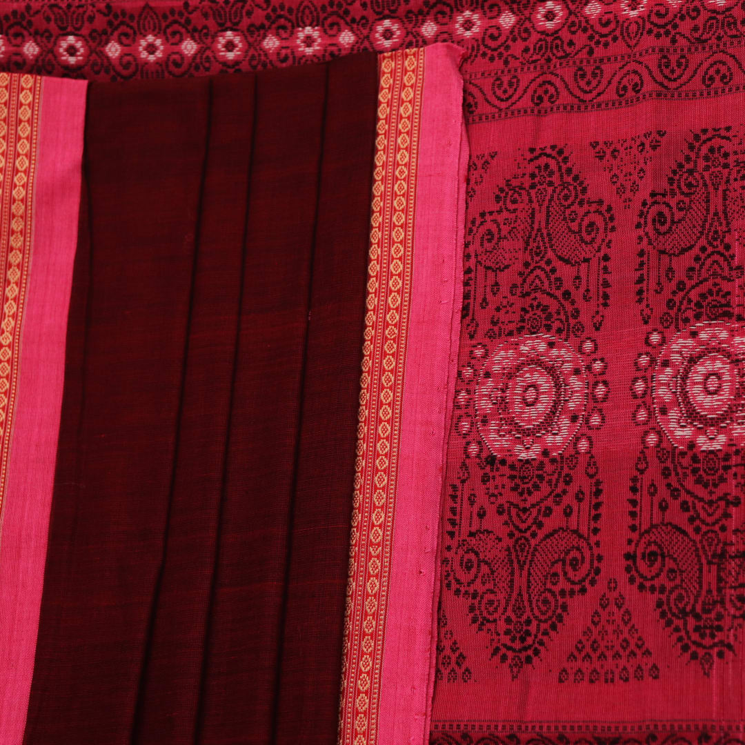 Full view of a maroon and pink cotton Bomkai saree featuring a butta pattern.