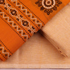 Detail of the coordinating blouse piece for the Bomkai cotton dress material in yellow and cream.