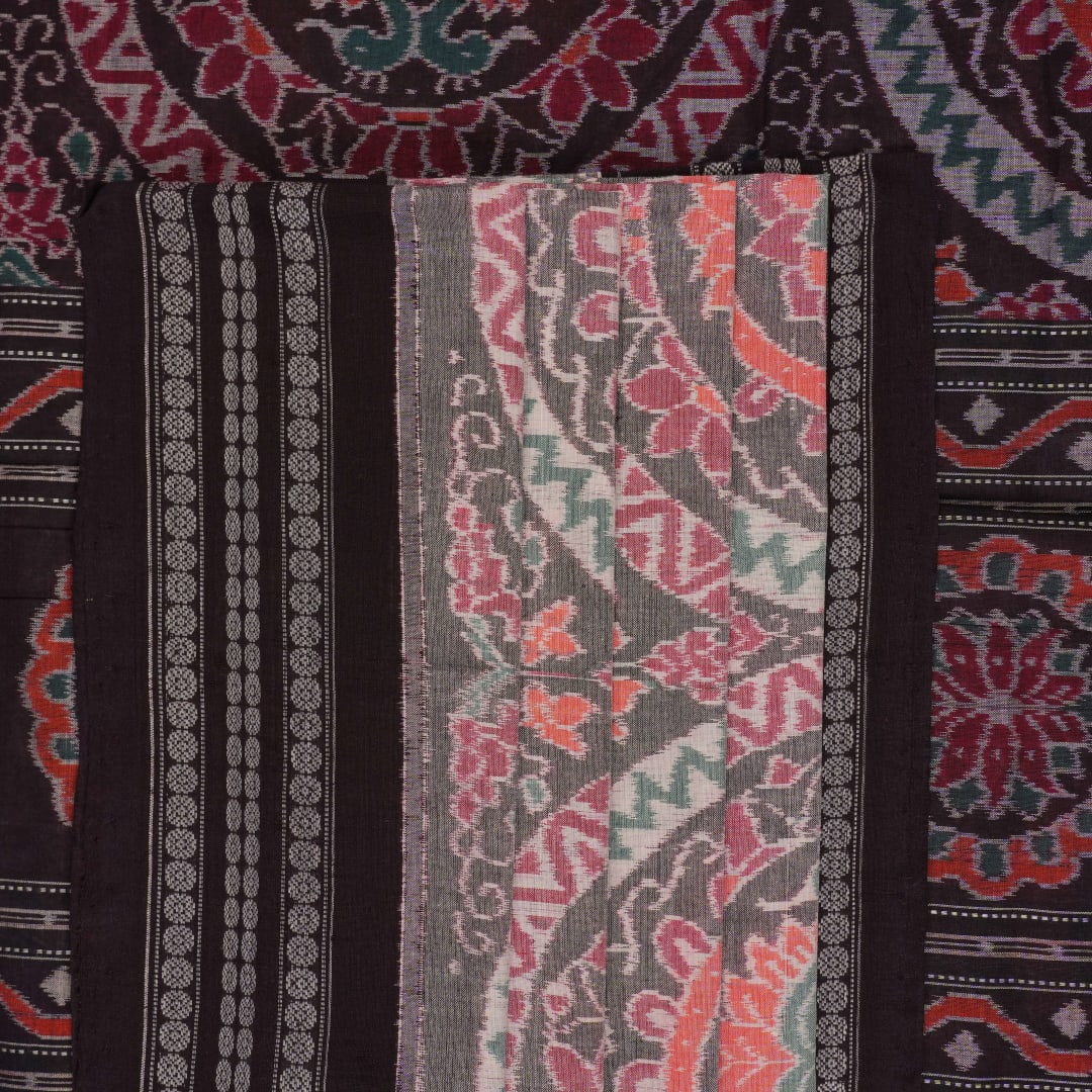 Full length flat layout of a brown and multi color Sambalpuri cotton saree highlighting the complete pattern.