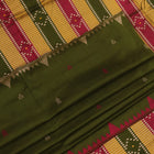 Close-up of the textured green Sambalpuri Silk Saree fabric, highlighting the woven butta pattern.