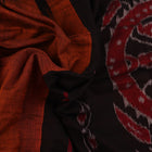 Brown and black plain Sambalpuri cotton saree elegantly draped.