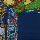 Close-up of the handwoven blue Patachitra silk saree, showcasing the detailed texture of the fabric.