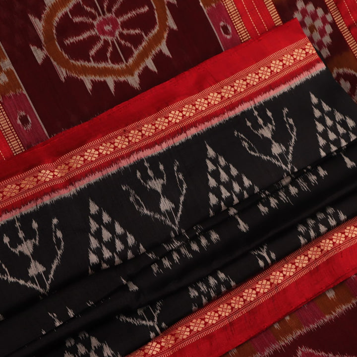 Full view of a black Khandua silk saree with red motifs.