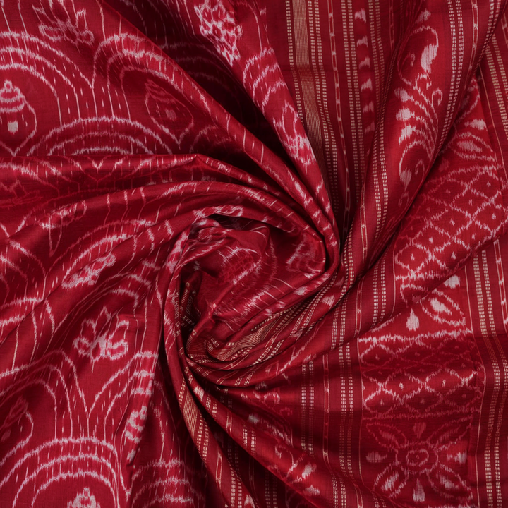 Full view of the maroon Sambalpuri silk saree with traditional motifs, displaying entire length and border.