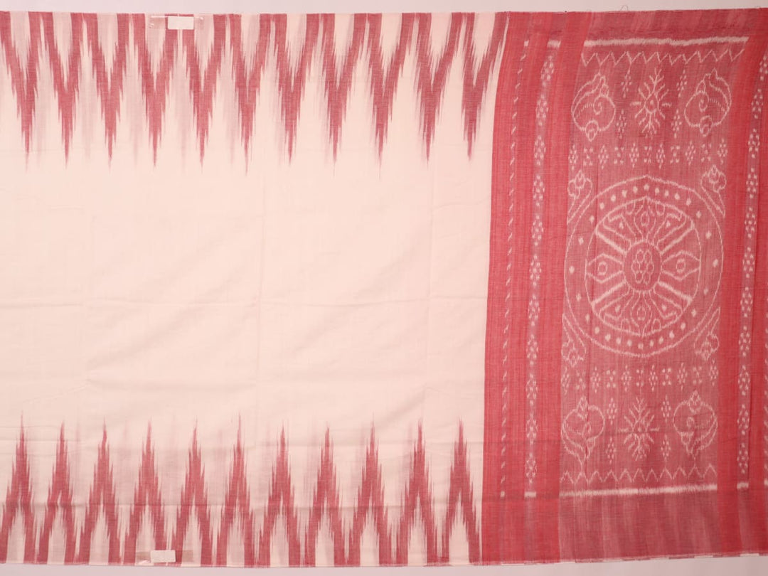 Plain white and maroon Sambalpuri cotton saree styled to show its drape and color combination.