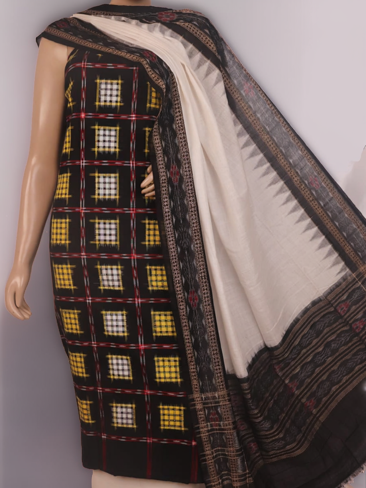 Detail of the black and white Sambalpuri cotton dress material's blouse piece with motifs.