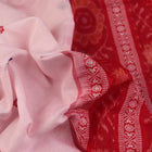 Full view of a white and red Sambalpuri cotton saree with butta pattern.
