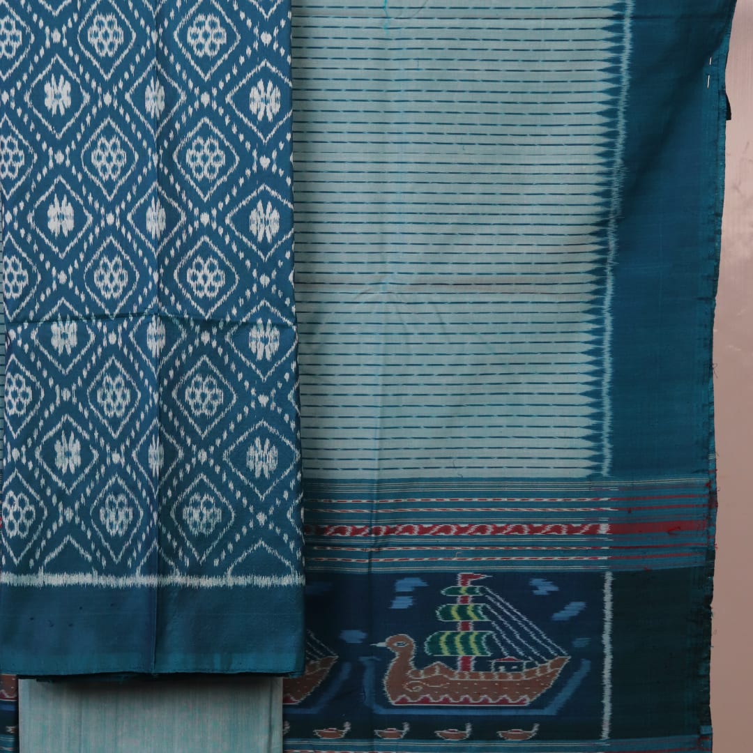 Detail of blue Sambalpuri silk dress material blouse piece with motifs.