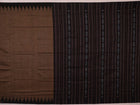 Full display of a handwoven plain grey Sambalpuri cotton saree with black details.