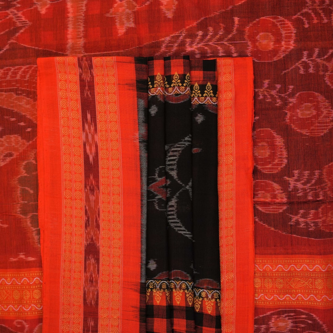 Full layout view of a black and orange Sambalpuri cotton saree showing the body, border, and pallu