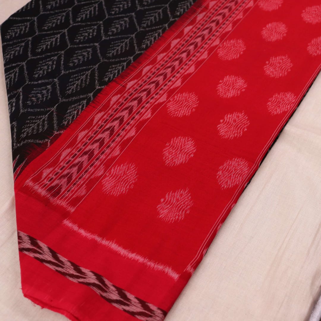 Stylishly draped Black Sambalpuri Dupatta in cotton with Red motifs