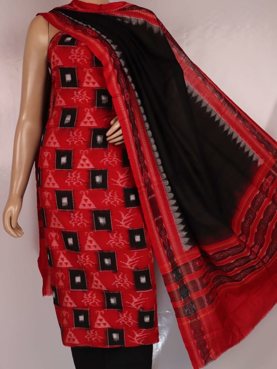 Close-up detail of motifs on a red and black cotton Sambalpuri dress material