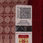 Close-up of multicolored Sambalpuri silk saree fabric texture showing intricate weave and maroon accents.