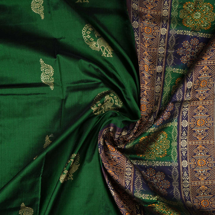 Close-up of Bomkai silk saree fabric, revealing rich texture and intricate handloom weave details.