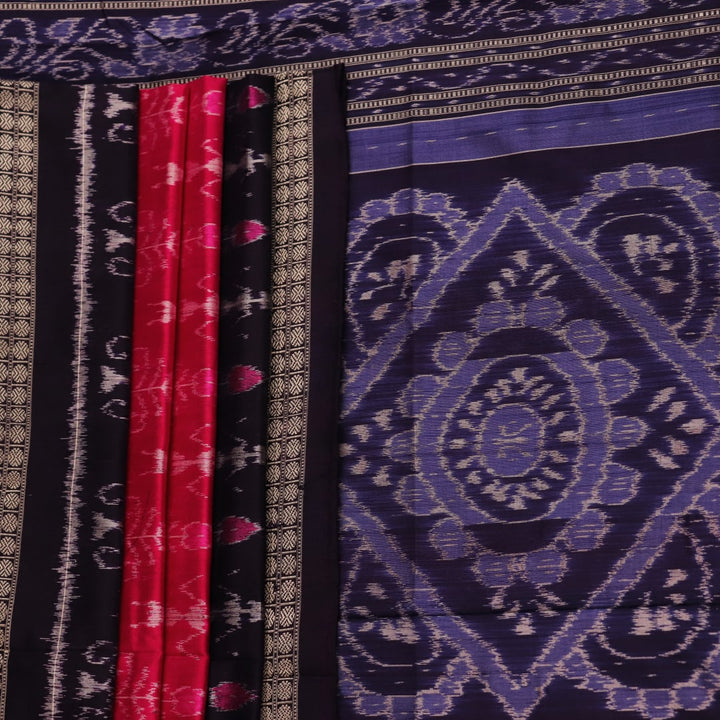 Close-up showing the intricate silk fabric texture of a magenta Sambalpuri saree with multicolor motifs.