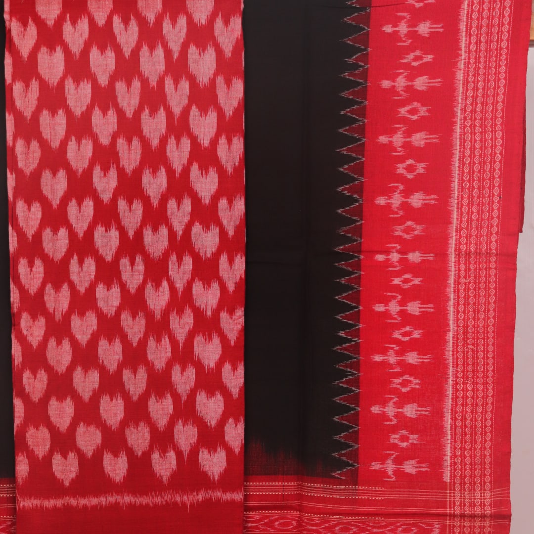 Detail of the Sambalpuri red-black cotton dress material blouse piece with motifs.