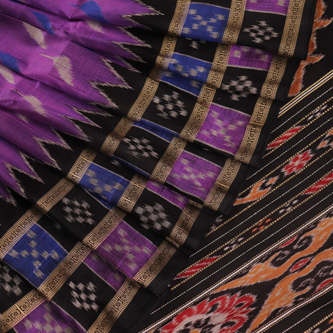 Full view of a violet and black Khandua silk saree showcasing its intricate motifs and elegant drape.