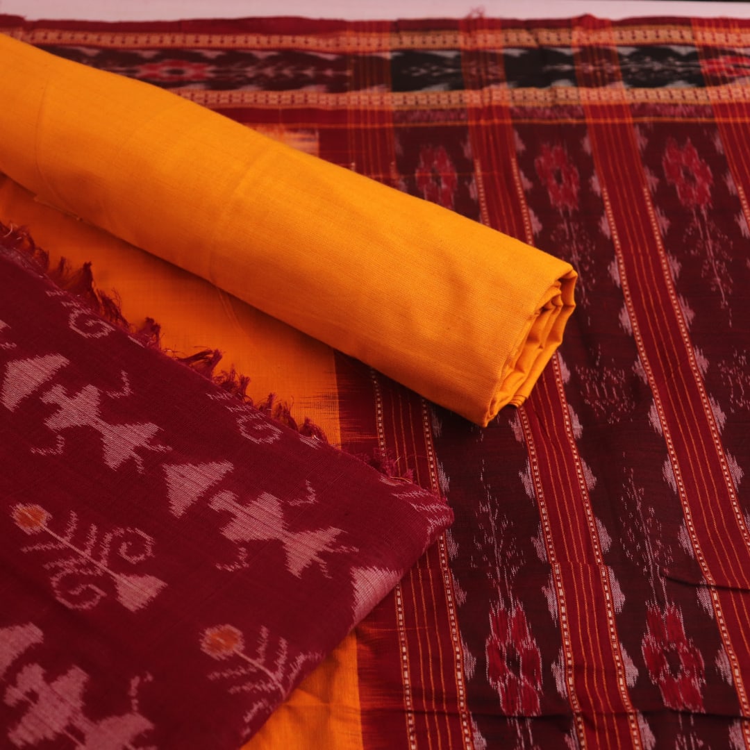 Maroon and yellow Sambalpuri cotton dress material blouse piece with motifs.