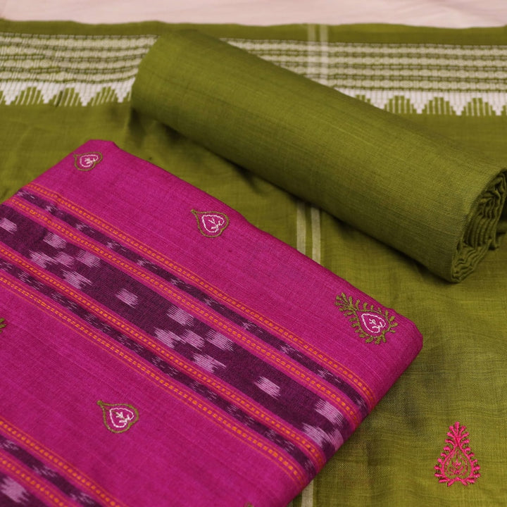 Close-up of blouse piece in magenta cotton with green Sambalpuri motifs