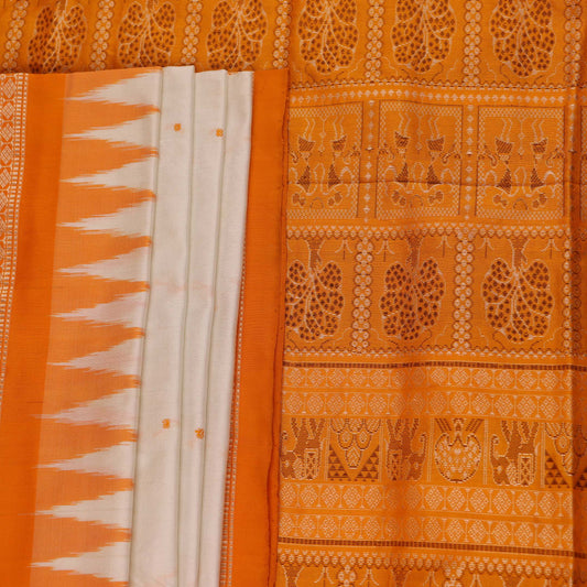 Close-up of Bomkai silk saree fabric texture in white with yellow butta pattern.
