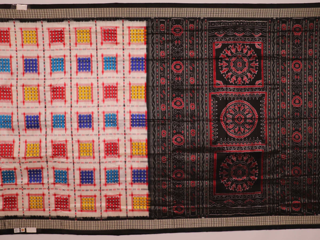 Close-up of white silk handloom saree with black Sambalpuri motifs