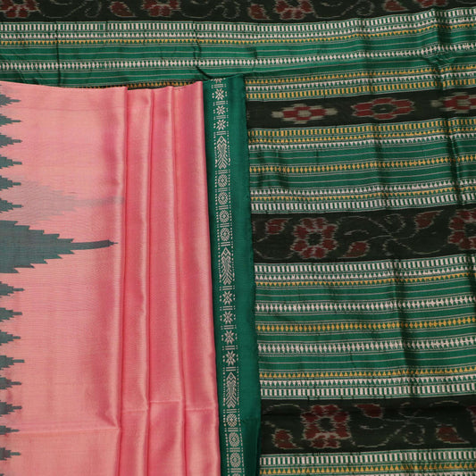 Close-up of the plain woven silk texture of a pink and green Sambalpuri saree.